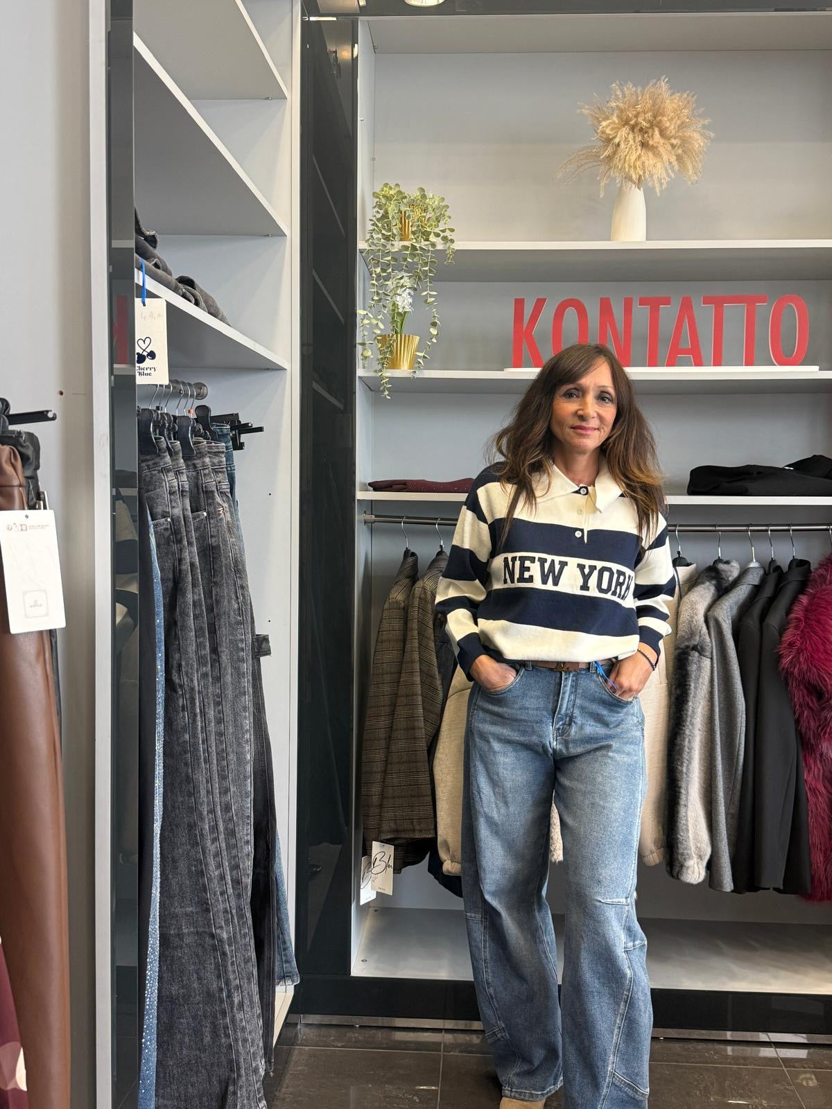 Maglione a righe con scritta